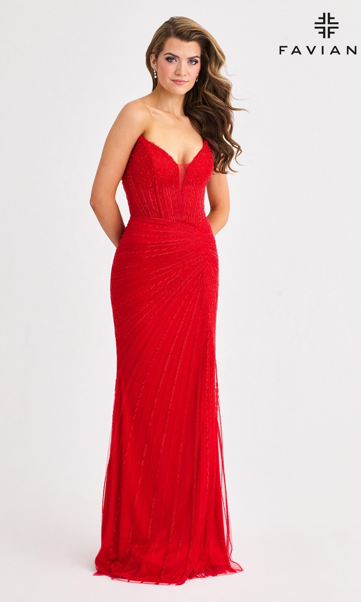 A woman poses in the Faviana 11410 long prom dress—a fitted strapless red gown with a sweetheart neckline and textured details—against a plain white background.